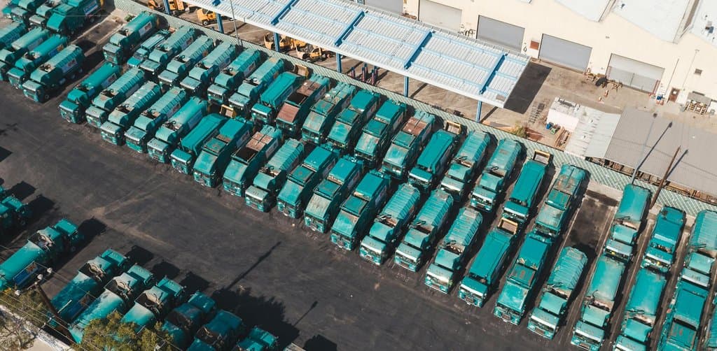Aerial view of truck fleet representing titled equipment collateral for asset-based lending