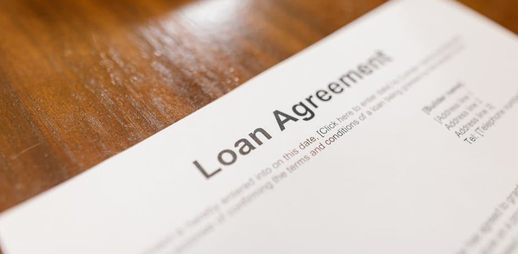 SBA 7(a) small business acquisition loan agreement document detailing financing terms and equity injection