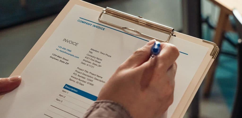 Reviewing an invoice that reflects business note cash flow performance