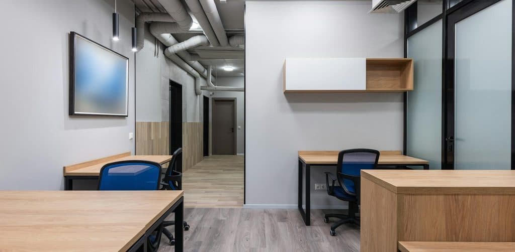 Modern office of a private debt fund acquiring seller-financed business notes